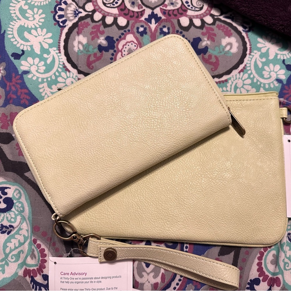 Thirty one all about Benjamin wallet rubie wristlet